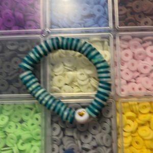 Blue and green clay bead